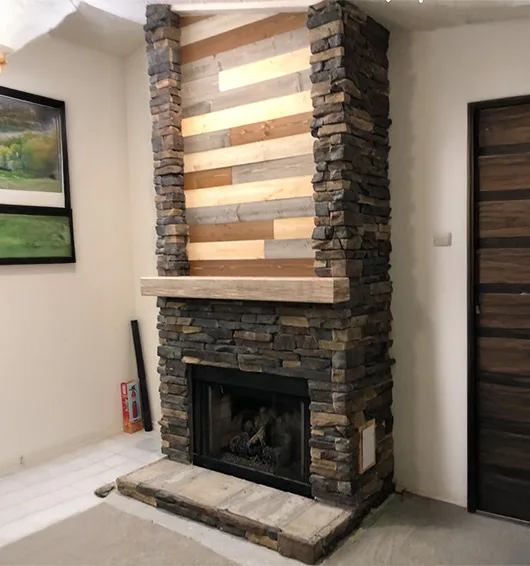 fireplace with custom masonry work